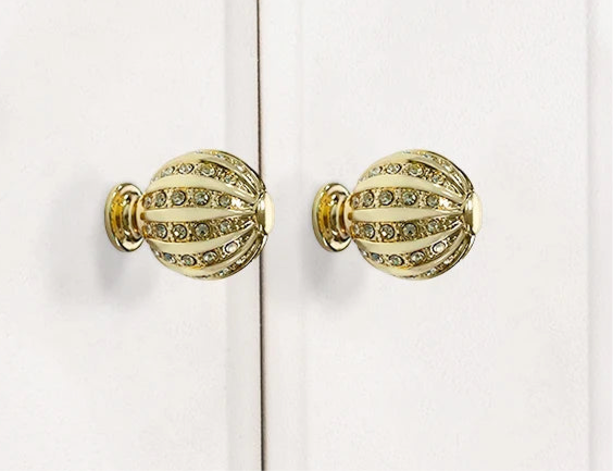 TOCO Brushed Gold Cabinet Handles - Moon & Knurled Lever Designs